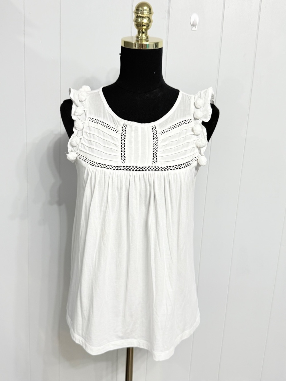 #12)  Women’s White Sleeveless Ruffled Yoke Top